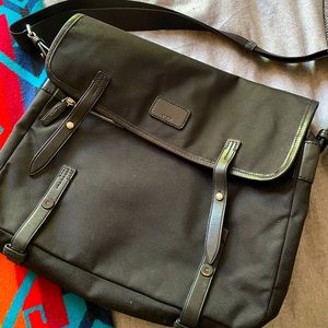 Beautiful unused Tumi over the shoulder bag.